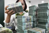 Ngân hàng làm mọi cách để hút tiền gửi dân cư
