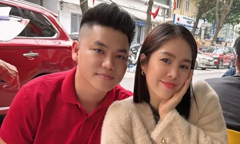 Lê Phương và chồng tình tứ đi dạo ở Hà Nội ngay cận Tết