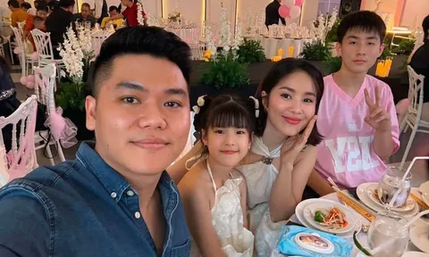 Lê Phương hạnh phúc cùng chồng mừng thôi nôi cháu gái