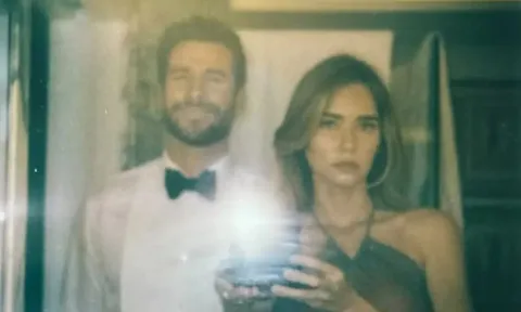 Liam Hemsworth dự đám cưới Taylor Swift cùng hôn thê