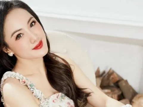 Phong cách thanh lịch, quyến rũ của BTV Hoài Anh