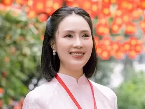 Hồng Diễm thướt tha áo dài hồng xuống phố