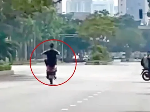 Con trai bốc đầu xe máy trên phố, bố bị phạt 9 triệu đồng